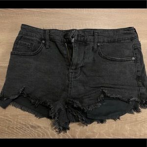 Black cutoff denim shorts